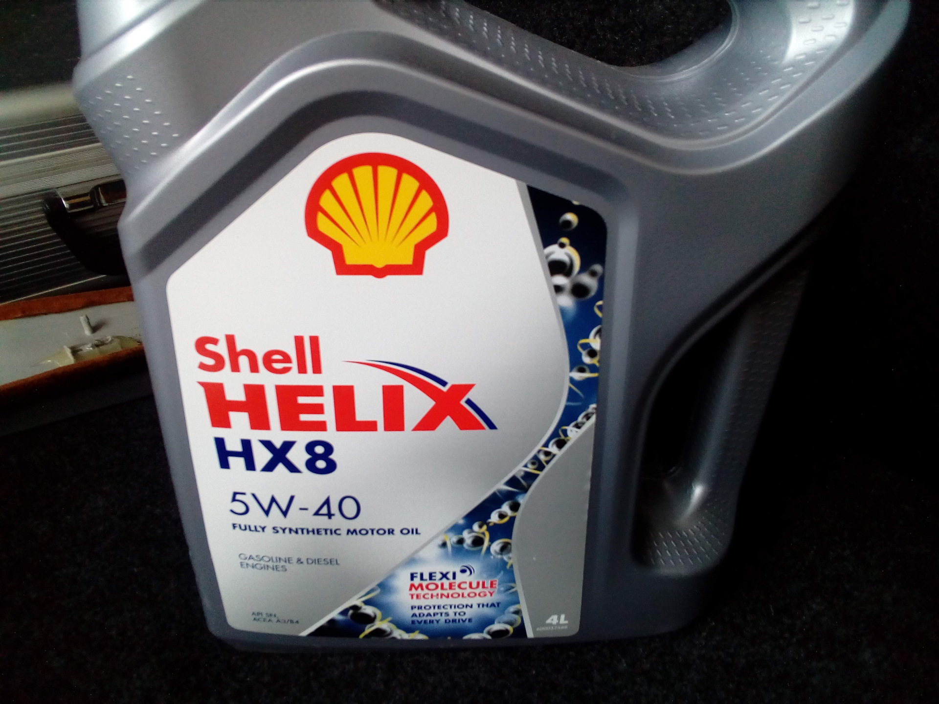 Масло моторное shell характеристики. Масло Shell hx8 5w40. Shell Helix hx8 Synthetic 5w-40. Шелл hx8 5w40. Shell 5w40 hx8 for Logan.